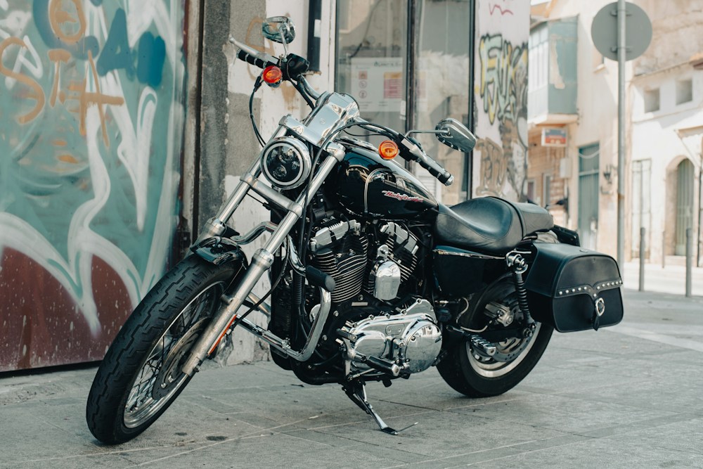 Street motorcycle parked beside a sidewalk